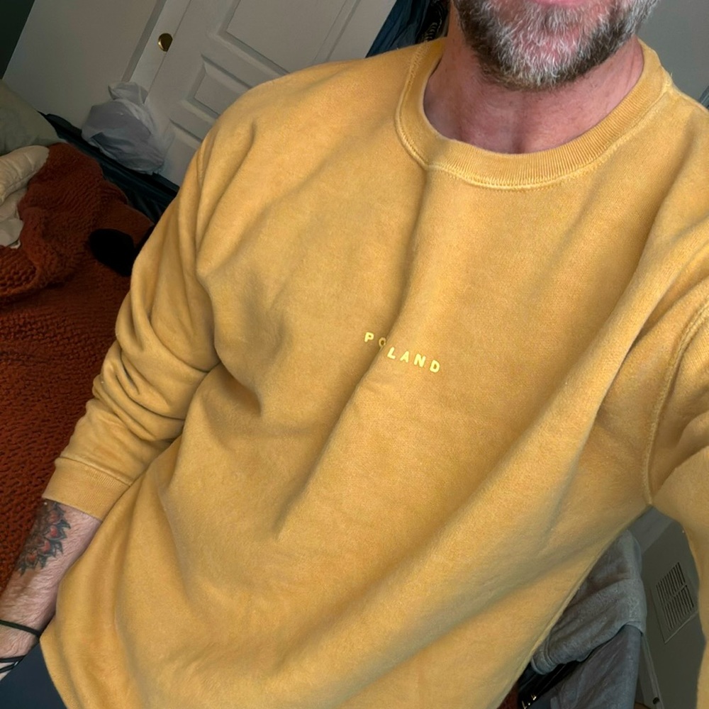 Topman long sleeve mustard colored sweatshirt. Text says “Portland” over chest